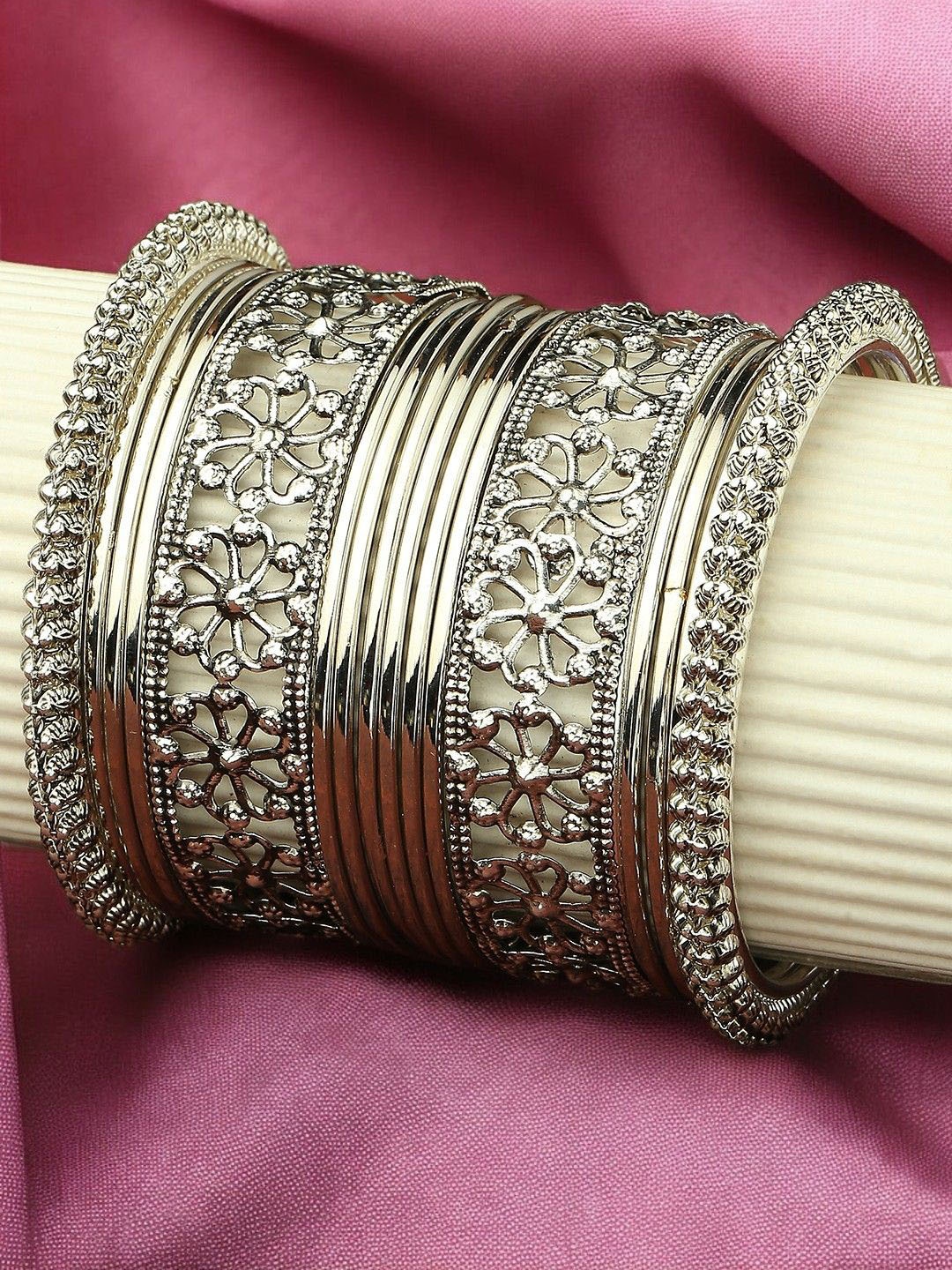 

Sangria Set Of 16 Oxidised Floral Design Bangles, Silver