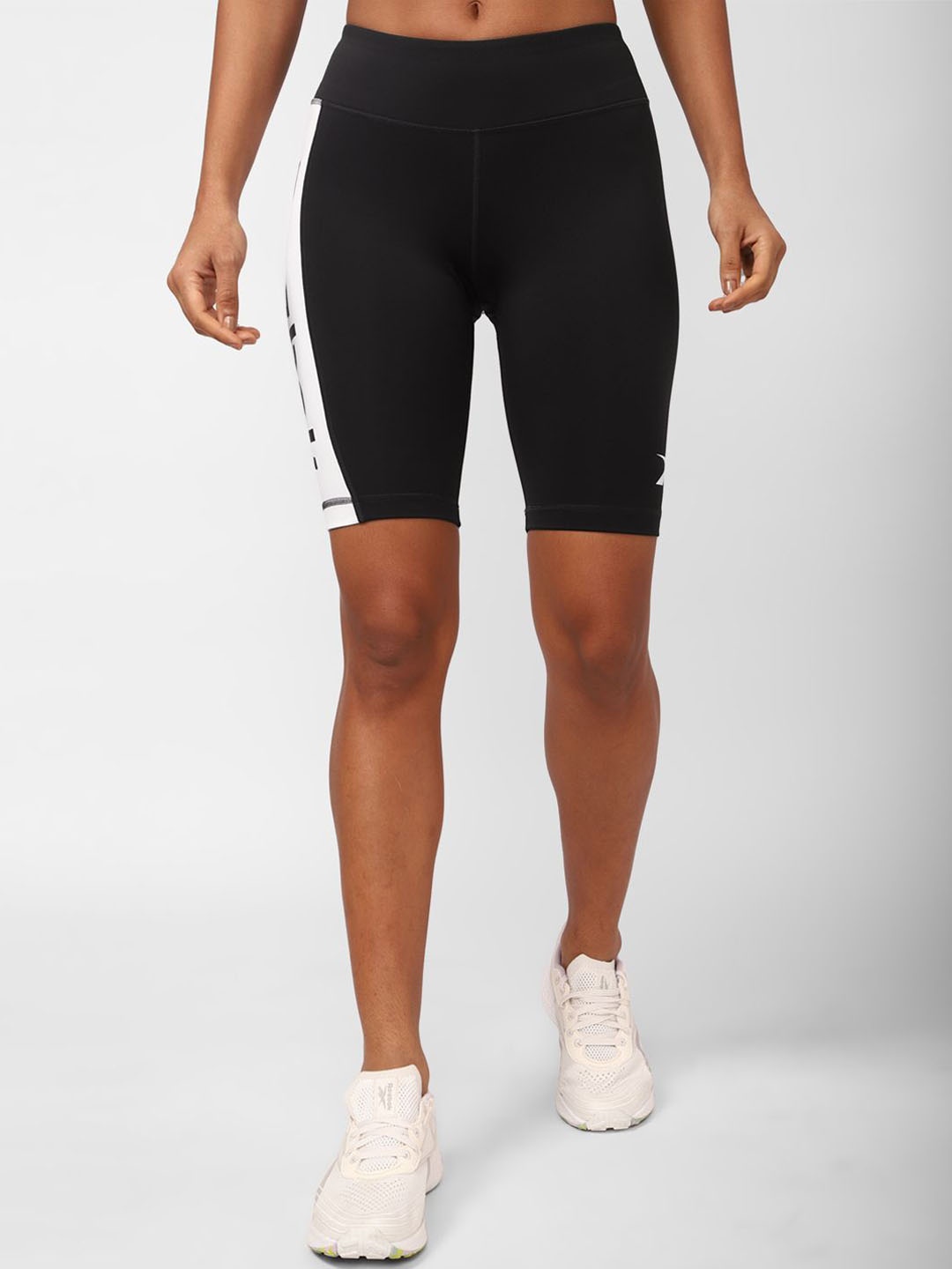 

Reebok Women Solid Elasticated WOR MYT Q3 Shorts, Black