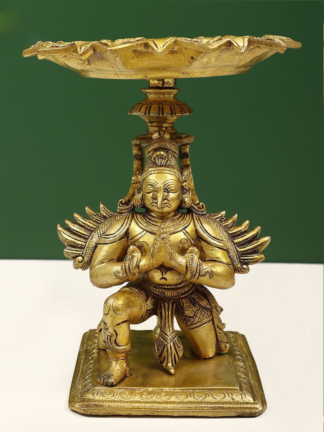 

Exotic India 6" Small Puja Lamp of Humble Garuda with Pointed Beak In Brass, Gold