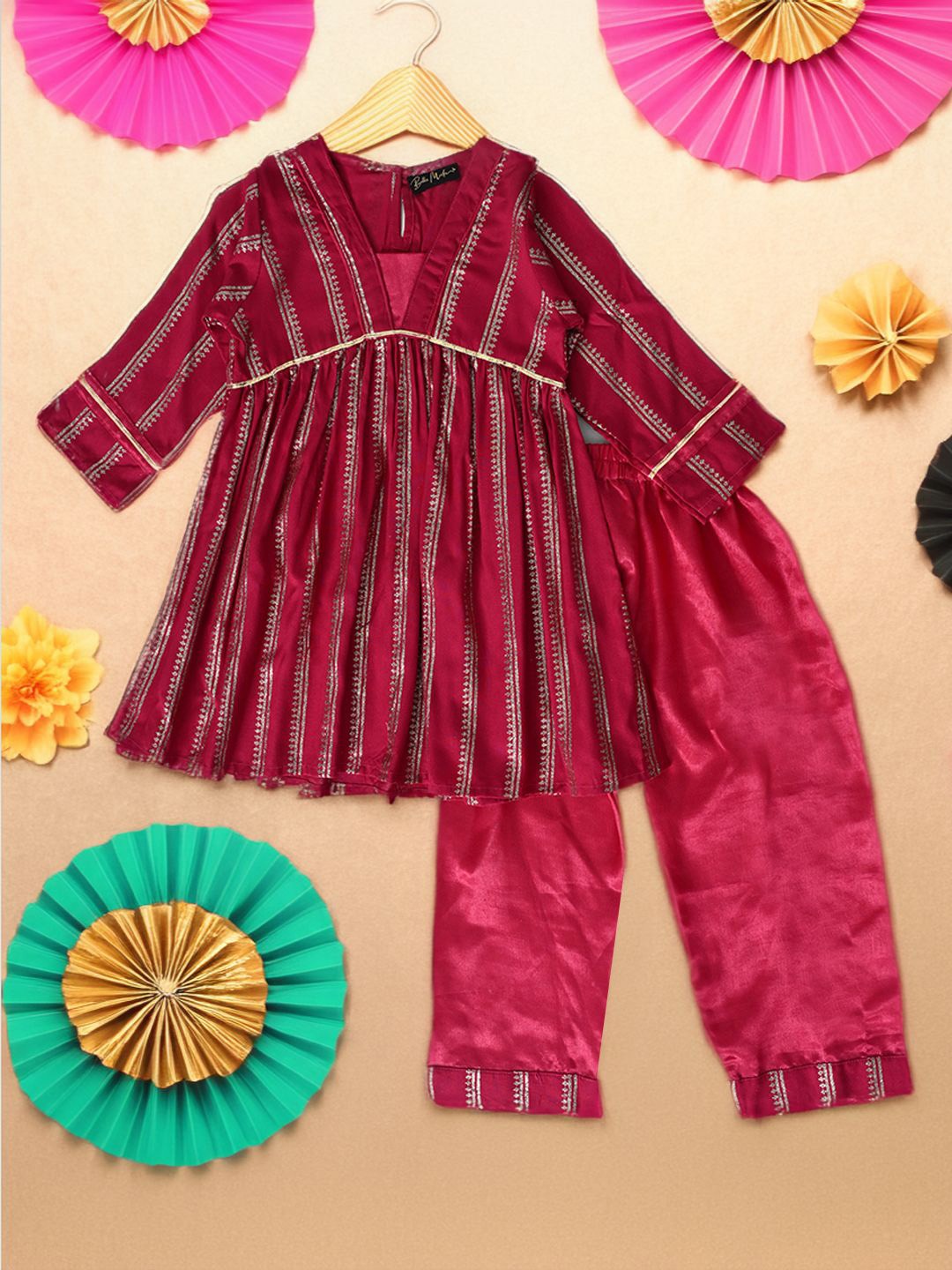 

Bella Moda Girls Ethnic Motifs Printed A-lIne Silk Crepe Kurti with Trousers, Magenta