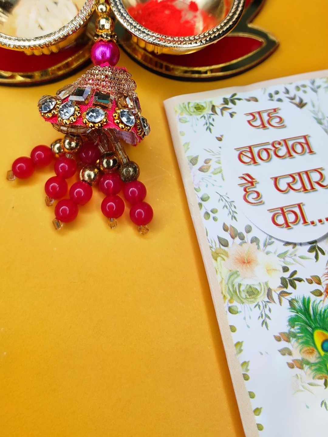 

NVR Stone Studded & Beaded Lumba Rakhi With Roli Chawal, Pink