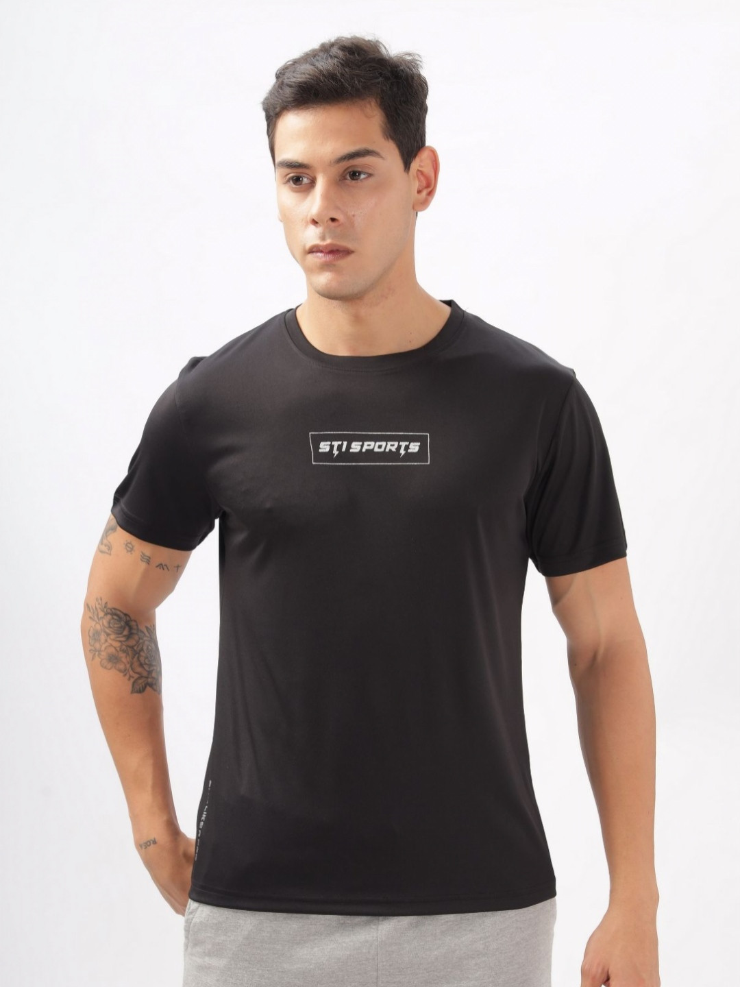 

STI Men Solid Round Neck T-Shirt, Black