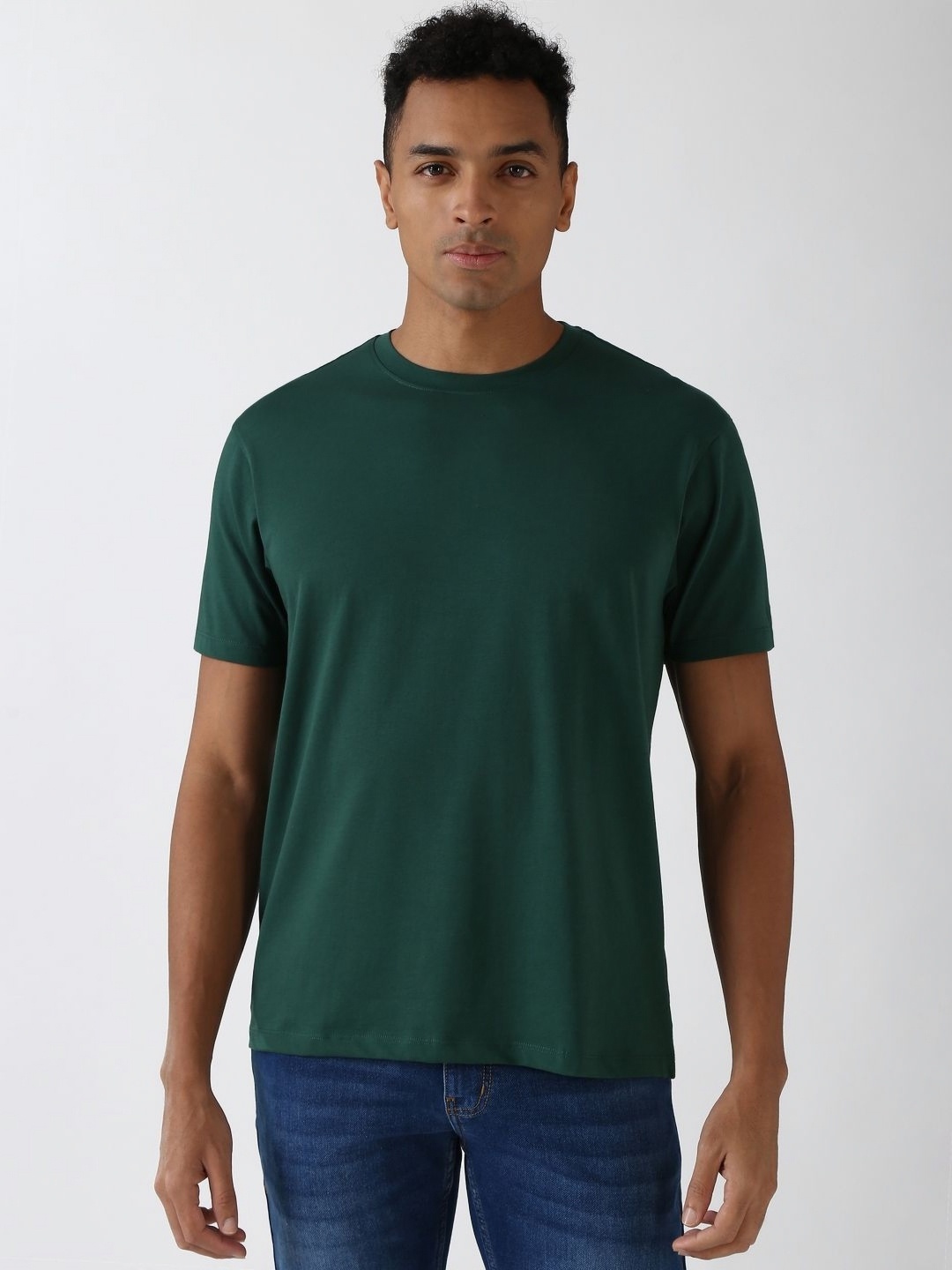 

Peter England Casuals Men Solid Round Neck Cotton T-Shirt, Green