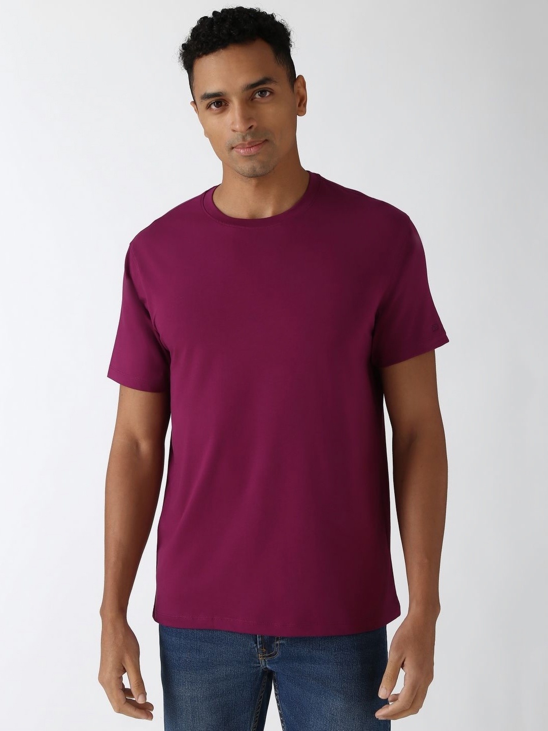 

Peter England Casuals Men Solid Round Neck Cotton T-Shirt, Purple