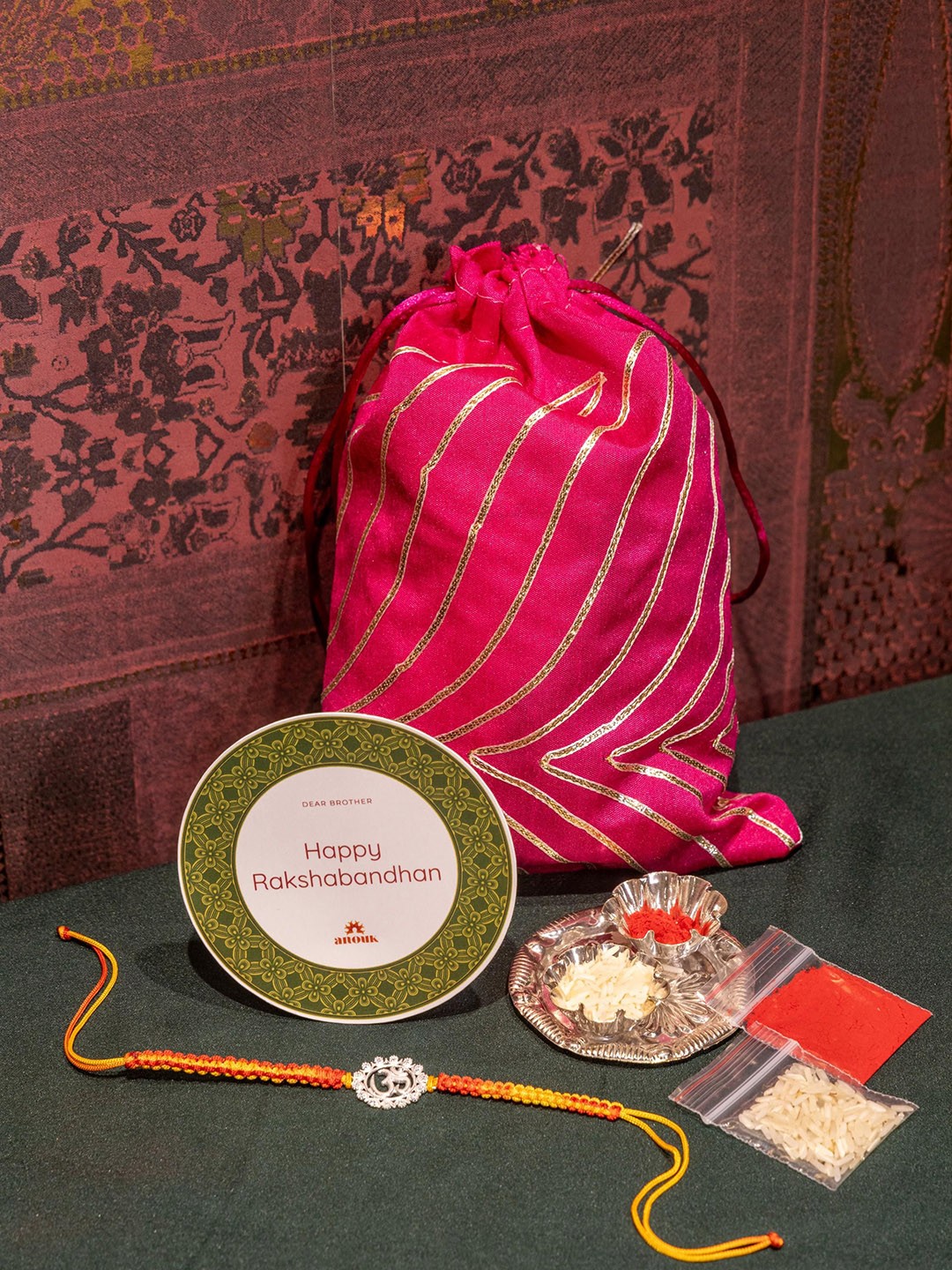 

Anouk Om Charm Thread Rakhi, Silver