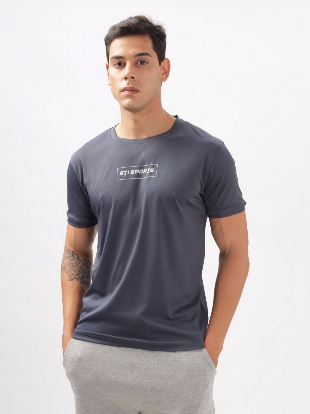 

STI Men Solid Round Neck T-Shirt, Grey
