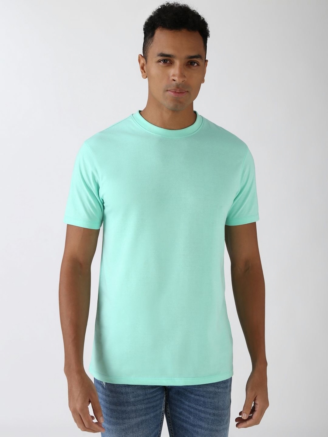 

Peter England Casuals Men Solid Round Neck Cotton T-Shirt, Green