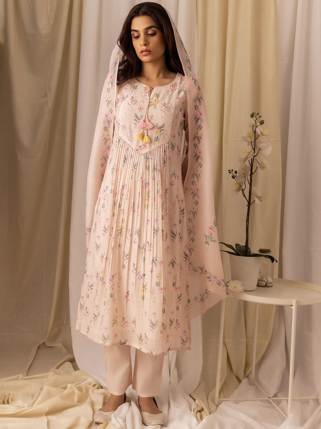 

Ode by House of Pataudi Floral Printed Pleated Style A-Line Kurta With Trousers & Dupatta, Cream