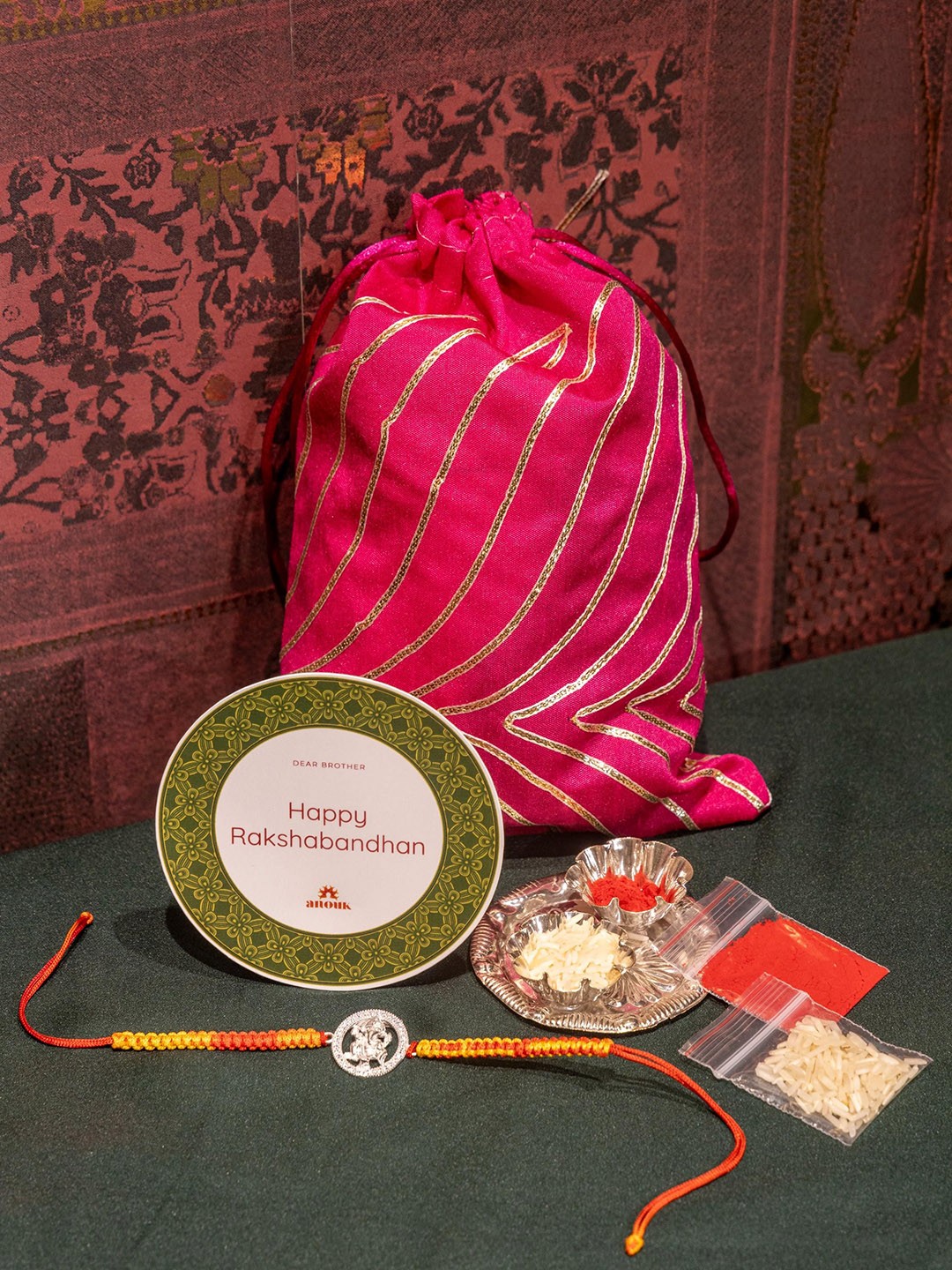

Anouk Lord Ganpati Charm Thread Rakhi, Silver