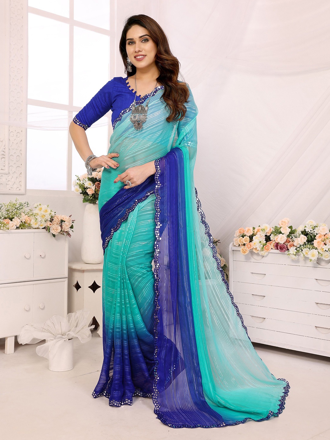 

Ambuja International Striped Mirror Work Poly Georgette Saree, Blue