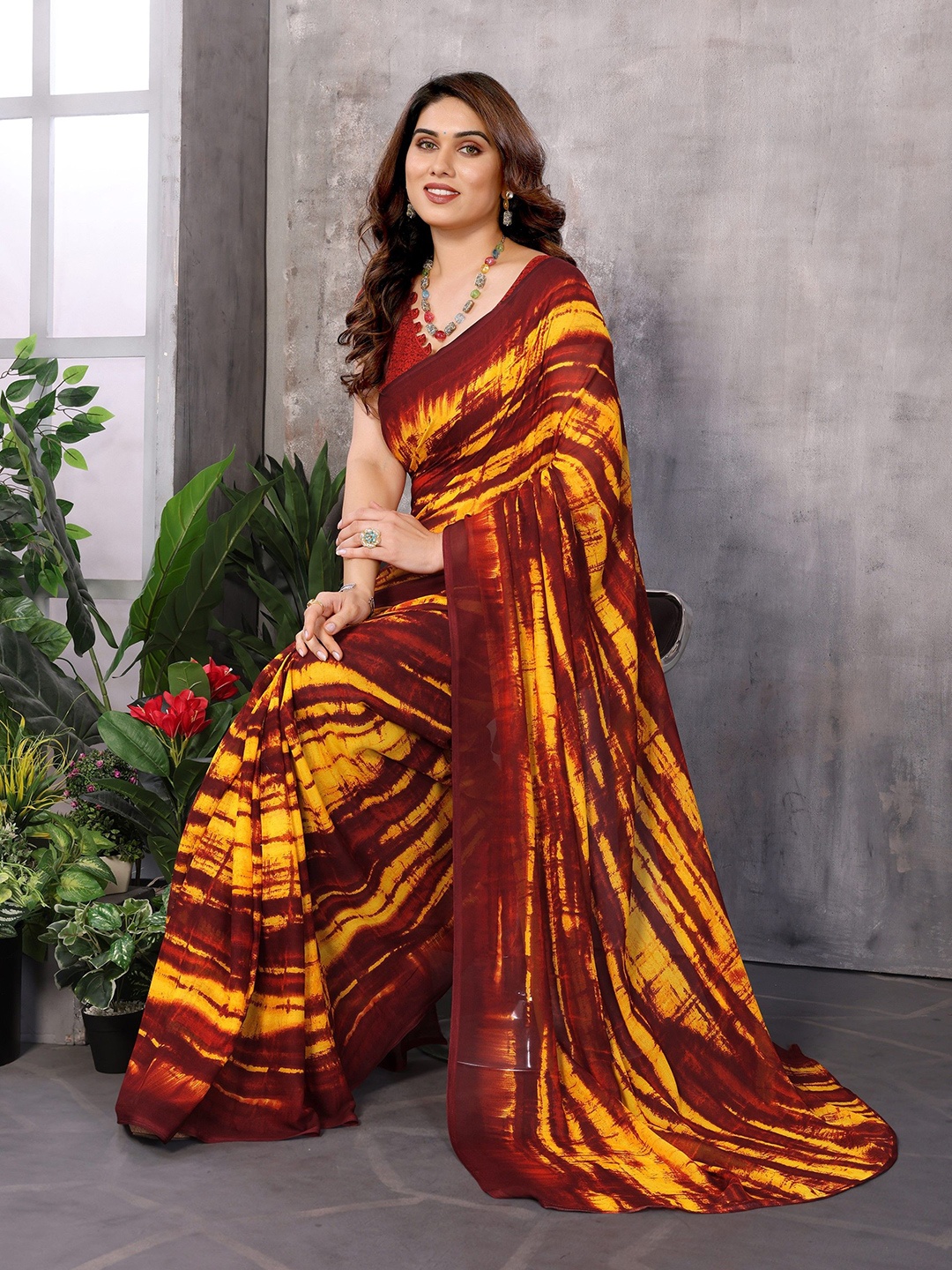 

Ambuja International Tie and Dye Poly Georgette Saree, Yellow