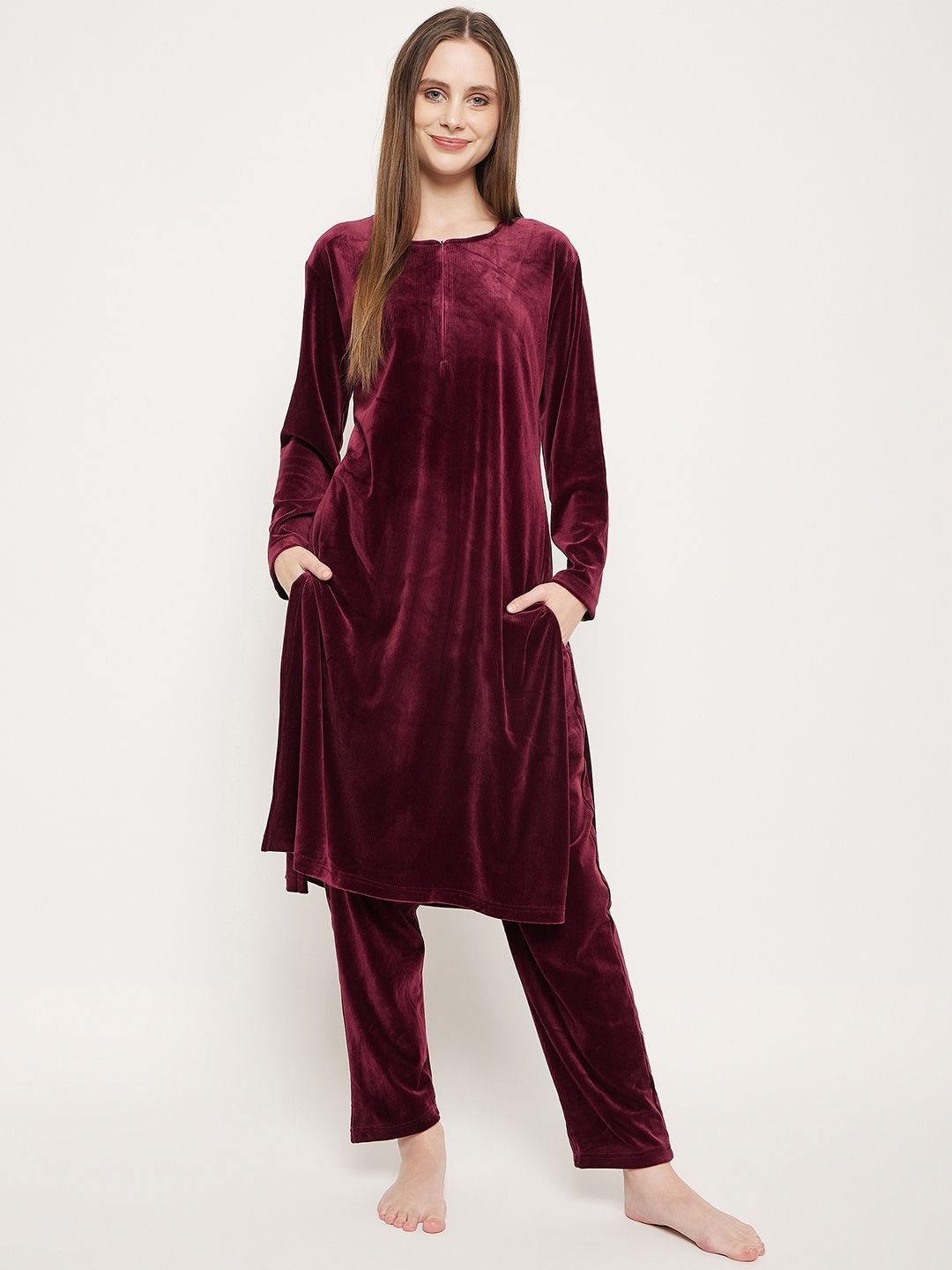 

Camey Women Flared Sleeves Thread Work Velvet Kurta, Maroon