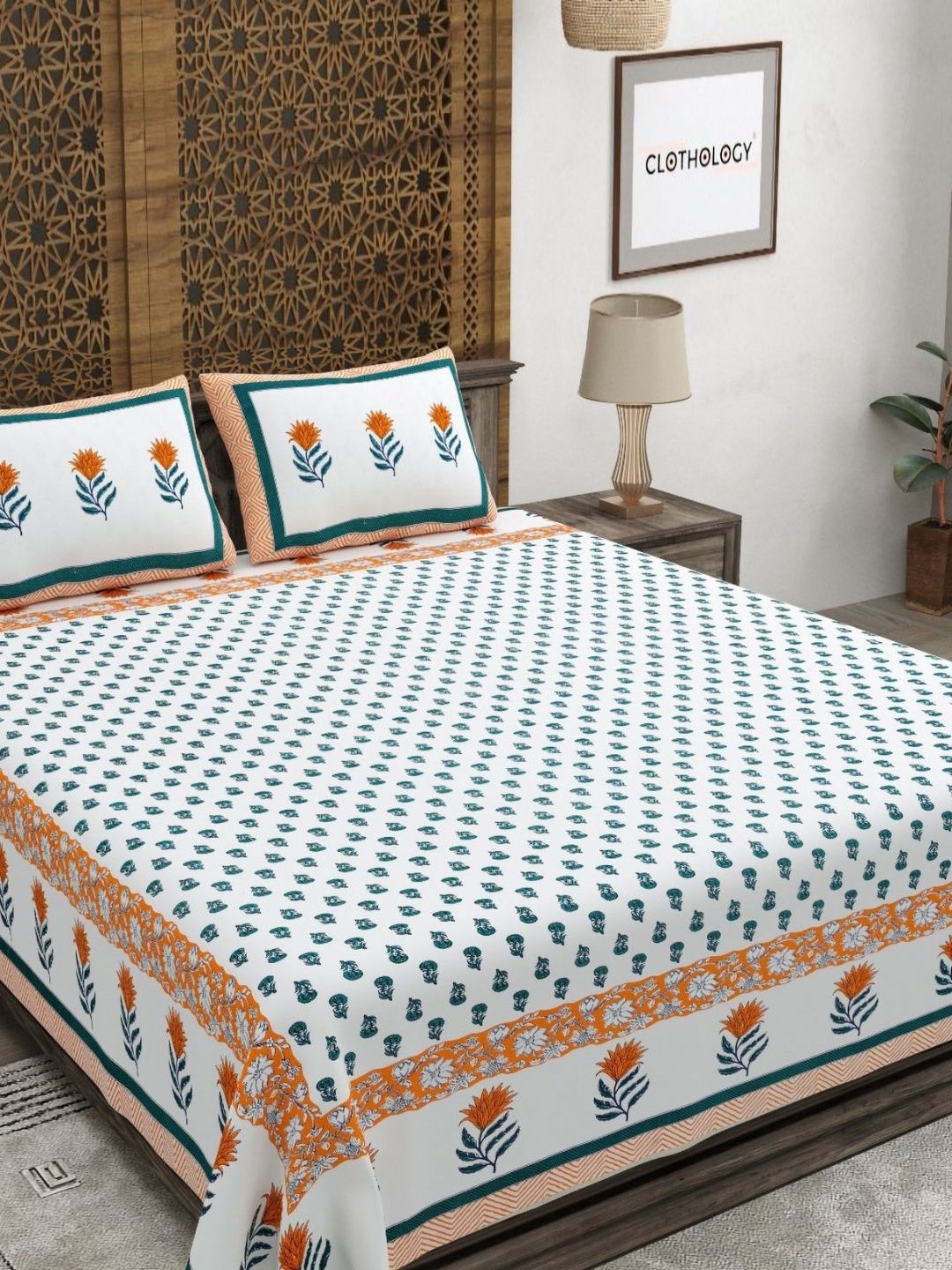 

CLOTHOLOGY Orange & White Floral Printed 180 TC Cotton King Bedsheet with 2 Pillow Covers