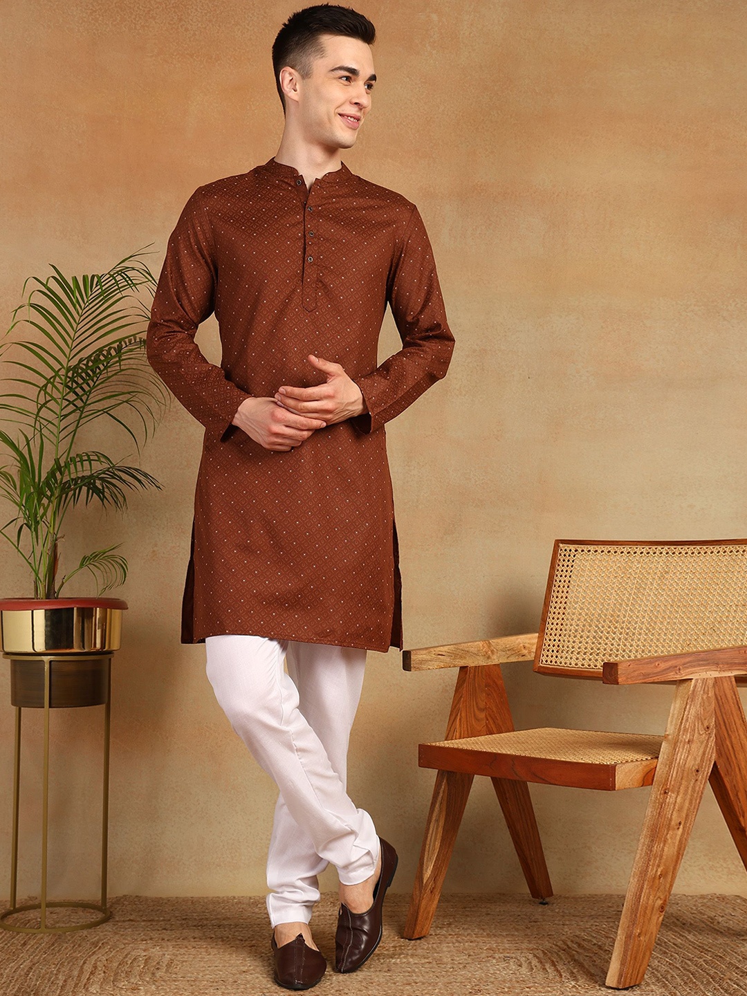 

Anouk Rust Orange Geometric Printed Thread Work Mandarin Collar Straight Kurta