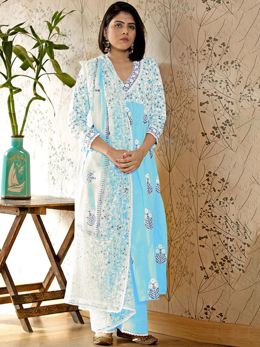 

Anni Designer Women Floral Printed Empire Kurta with Palazzos & With Dupatta, Blue