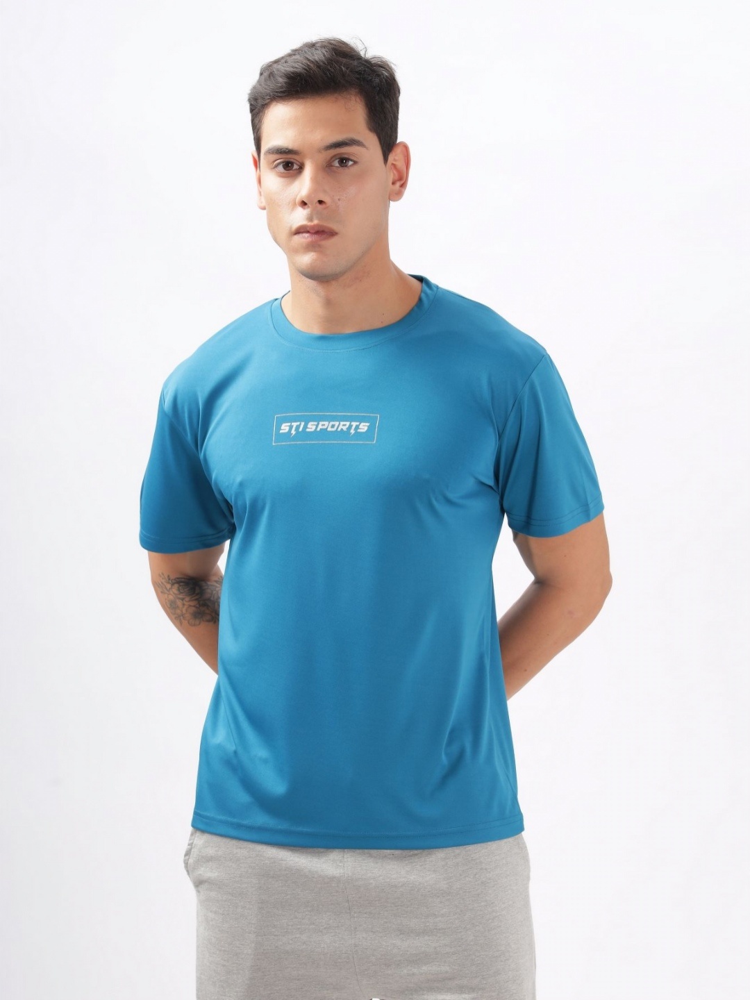 

STI Men Solid Round Neck T-Shirt, Teal