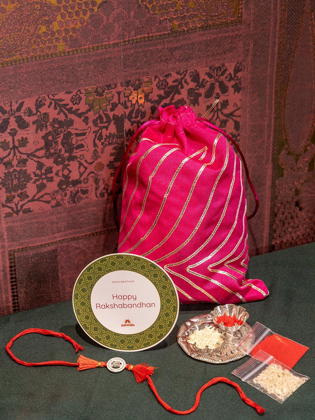 

Anouk Jai Shree Ram Charm Thread Rakhi, Red