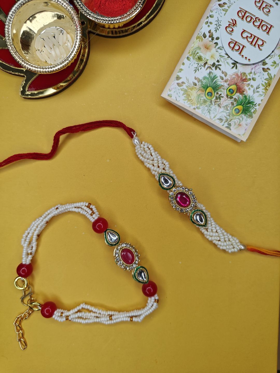 

NVR Stone Studed & Beaded Bhaiya Bhabhi Thread Rakhi With Roli Chawal, Red