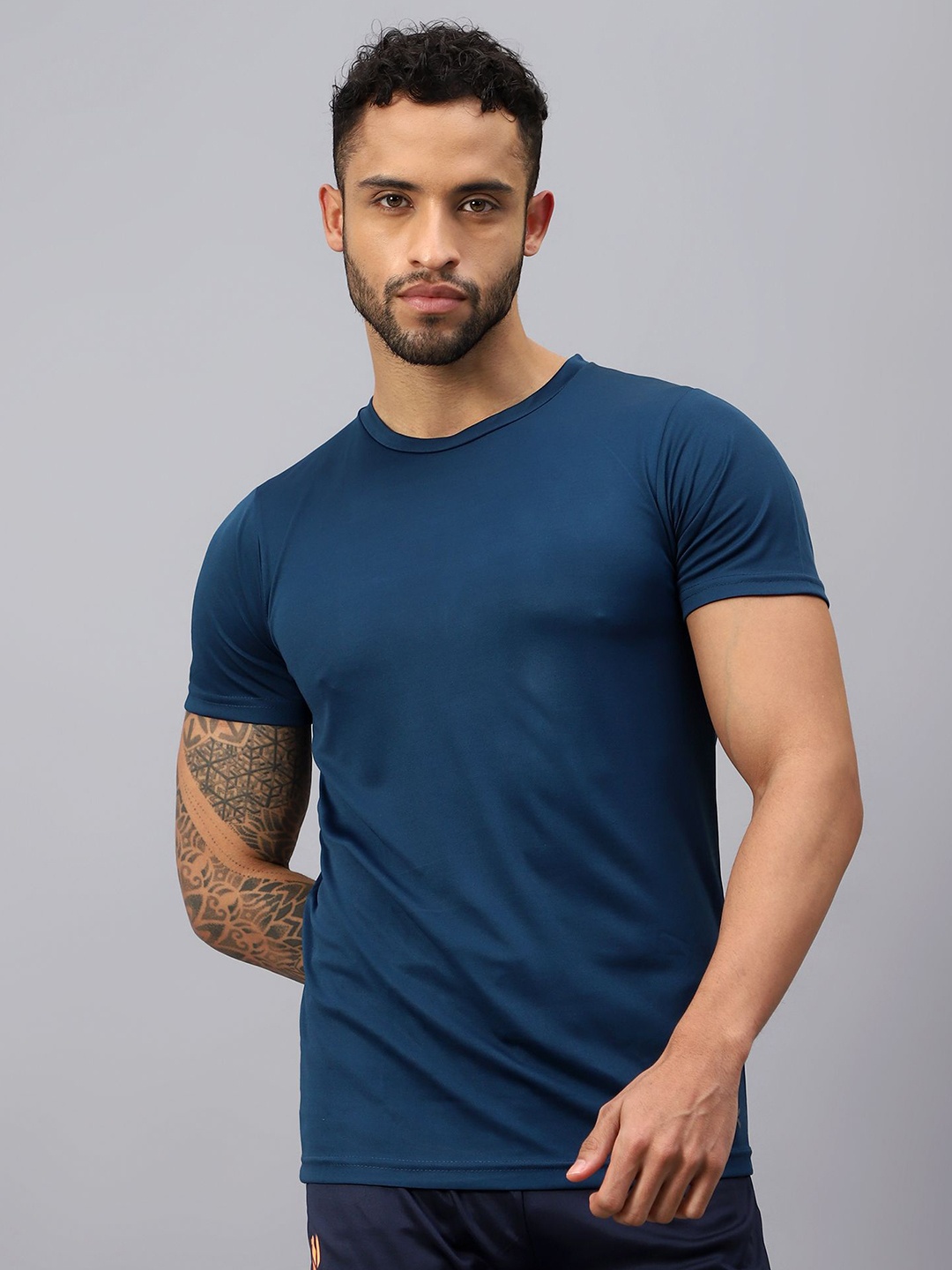 

VECTOR X Men Solid Round Neck T-Shirt, Teal