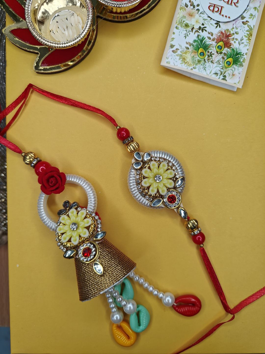 

NVR Stone Studded & Beaded Bhaiya Bhabhi Thread Rakhi with Roli Chawal & Greeting Card, Red
