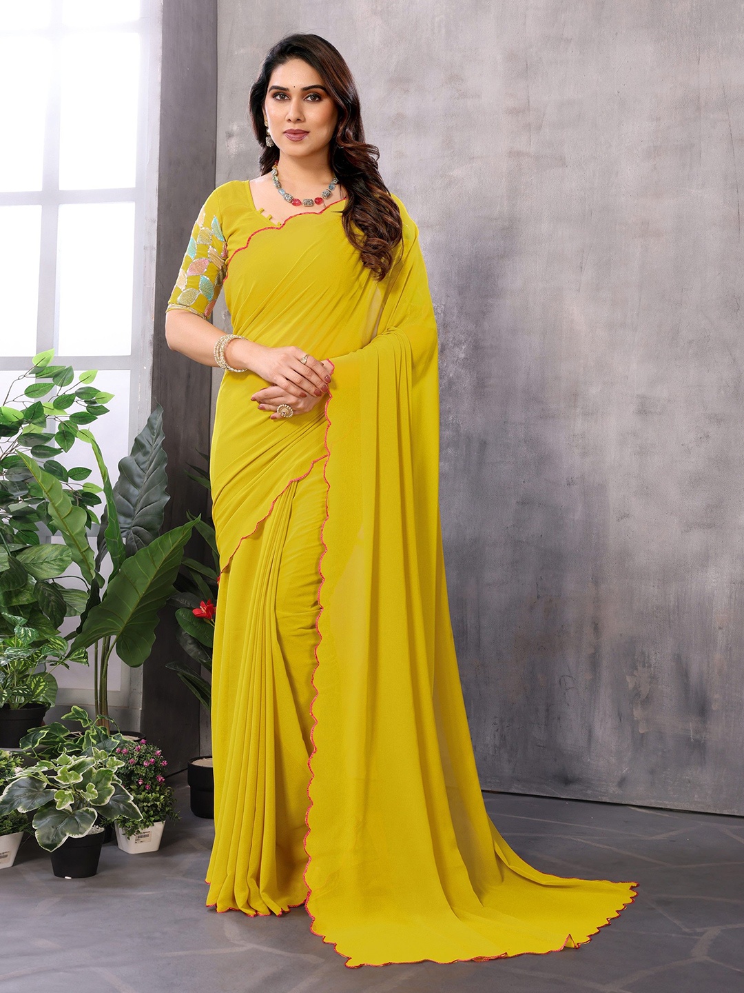 

Ambuja International Embroidered Pure Georgette Saree, Yellow