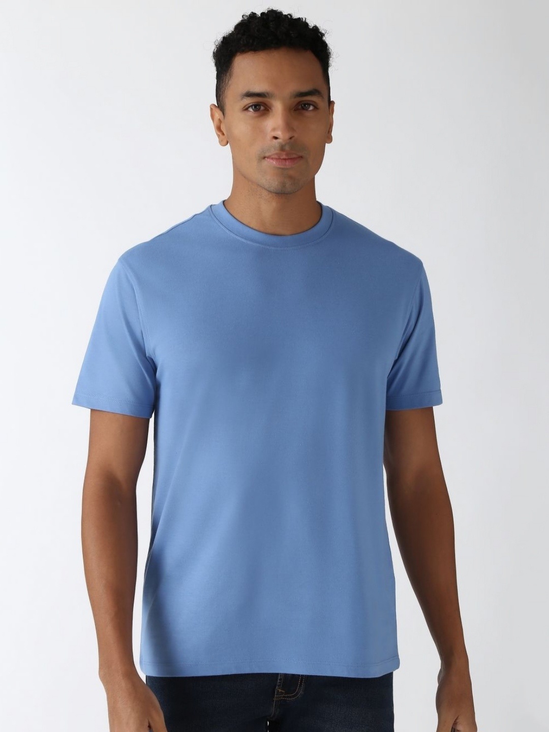 

Peter England Casuals Men Solid Round Neck Cotton T-Shirt, Blue