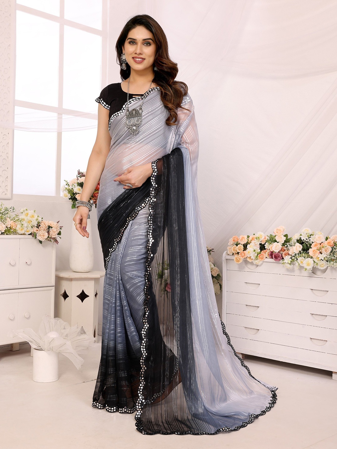 

Ambuja International Striped Mirror Work Poly Georgette Saree, Grey