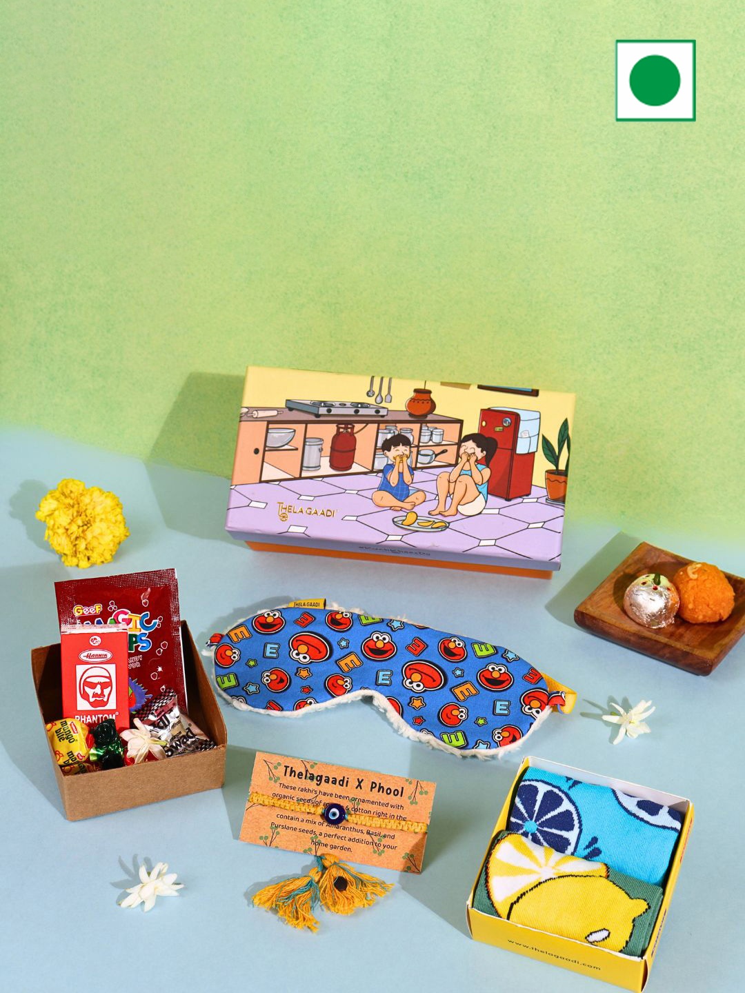 

Thela Gaadi Floral Thread Rakhi with Assorted Gifts, Yellow