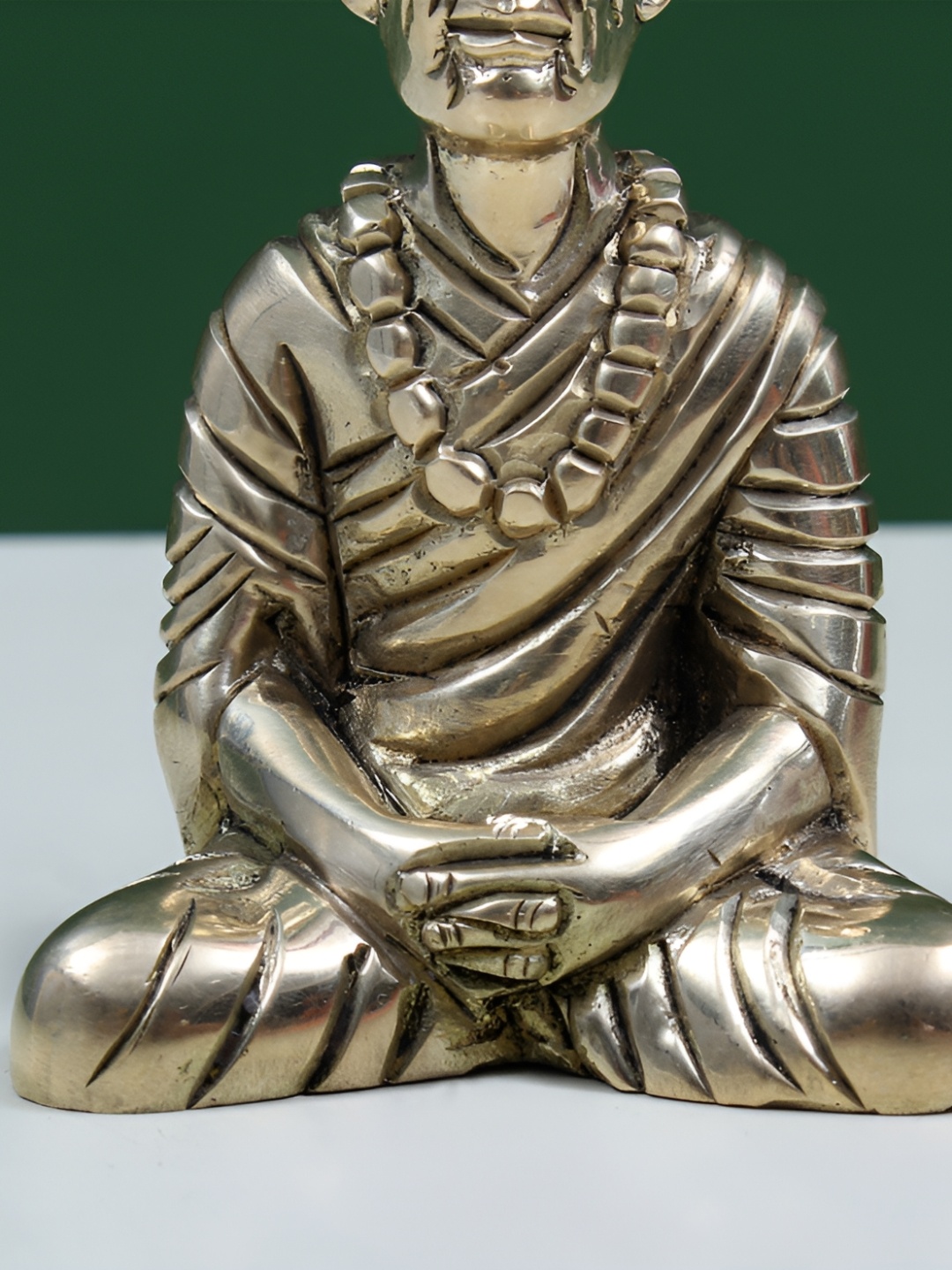 

Exotic India Gold-Toned Religious Figurine Showpiece