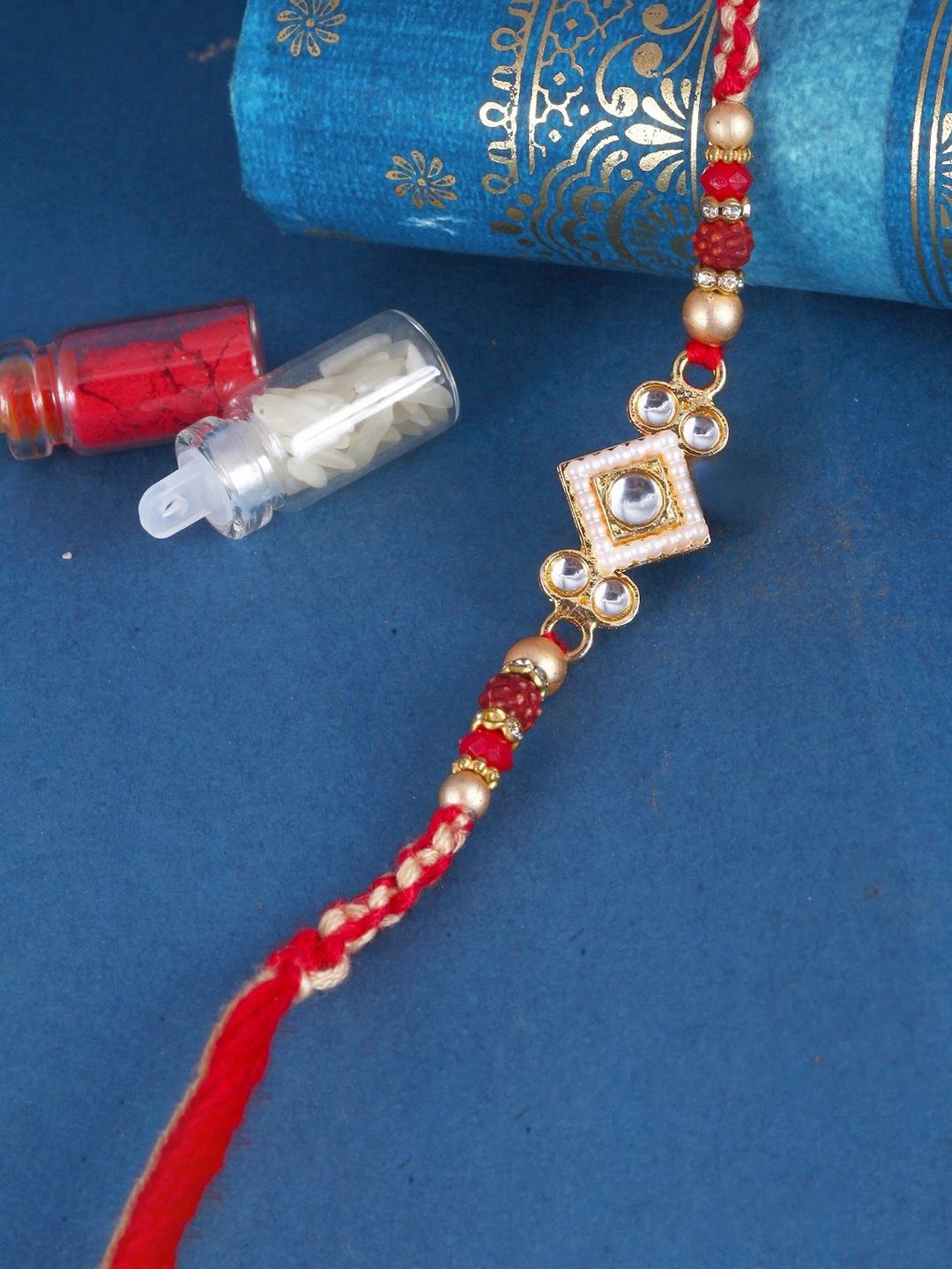 

Vighnaharta Set Of 4 Pearls Thread Rakhis, Pink