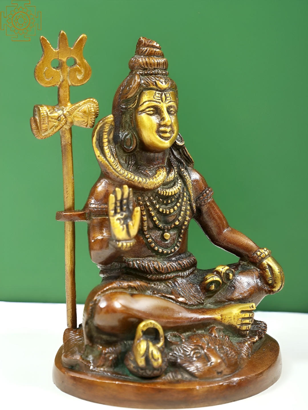 

Exotic India Brown & Yellow Religious Idol Showpiece
