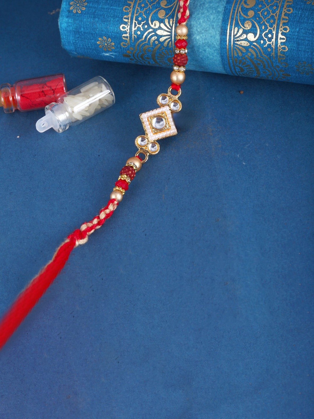 

Vighnaharta Thread Rakhi, Red