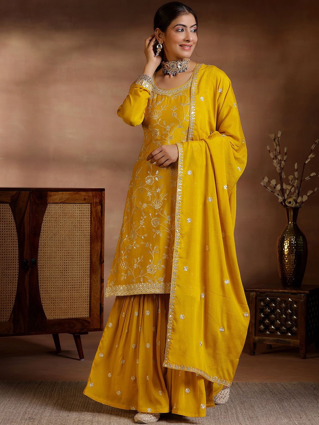 

Libas Floral Embroidered Round Neck Sequinned Straight Kurta With Sharara & Dupatta, Mustard