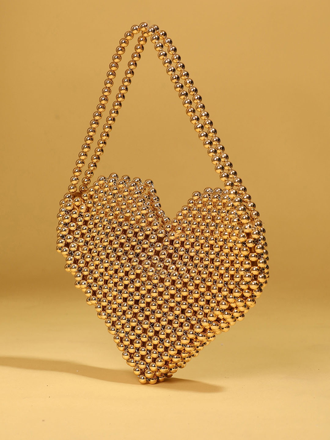 

MODARTA Structured Sling Bag, Gold
