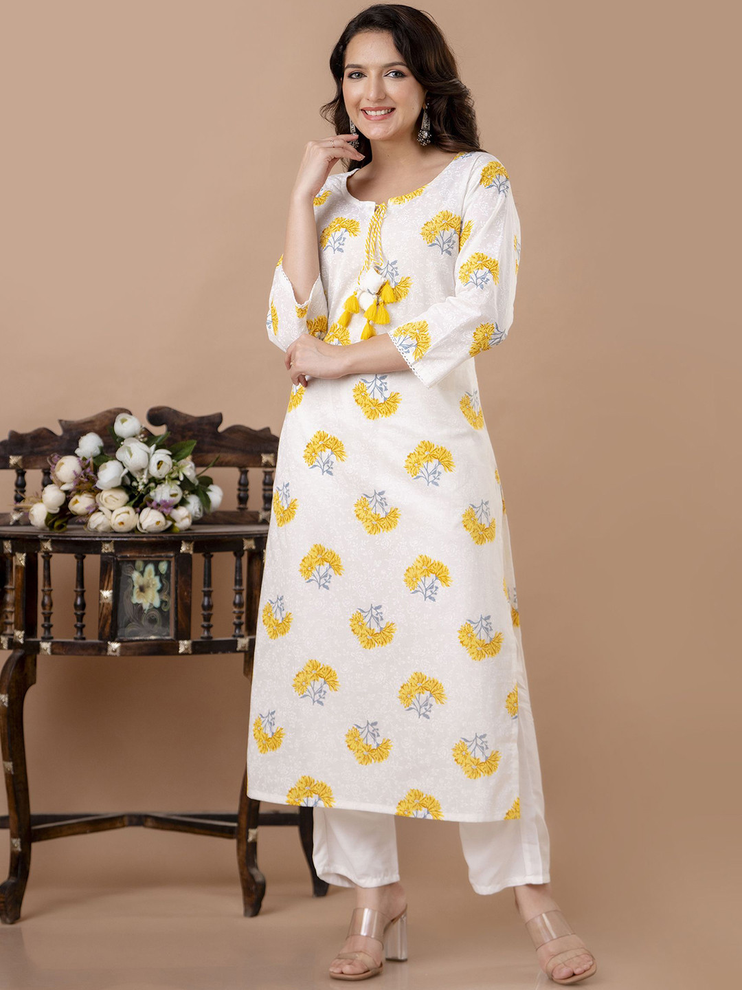 

Veshviti Floral Printed Tie-Up Neck Pure Cotton Straight Kurta with Trousers, Yellow