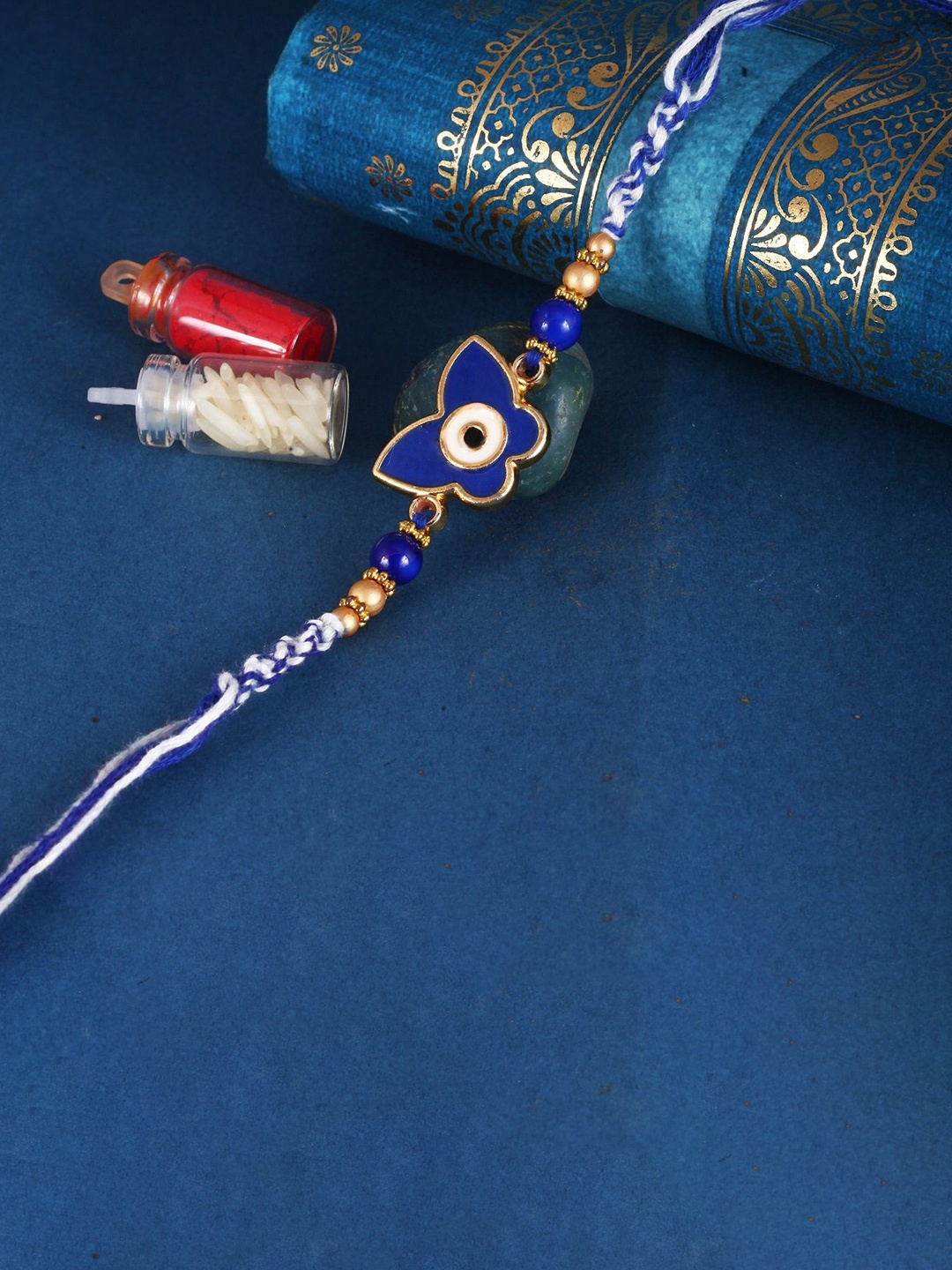 

Vighnaharta Set of 4 Religious Stones Studded & Pearls Thread Rakhis, Blue