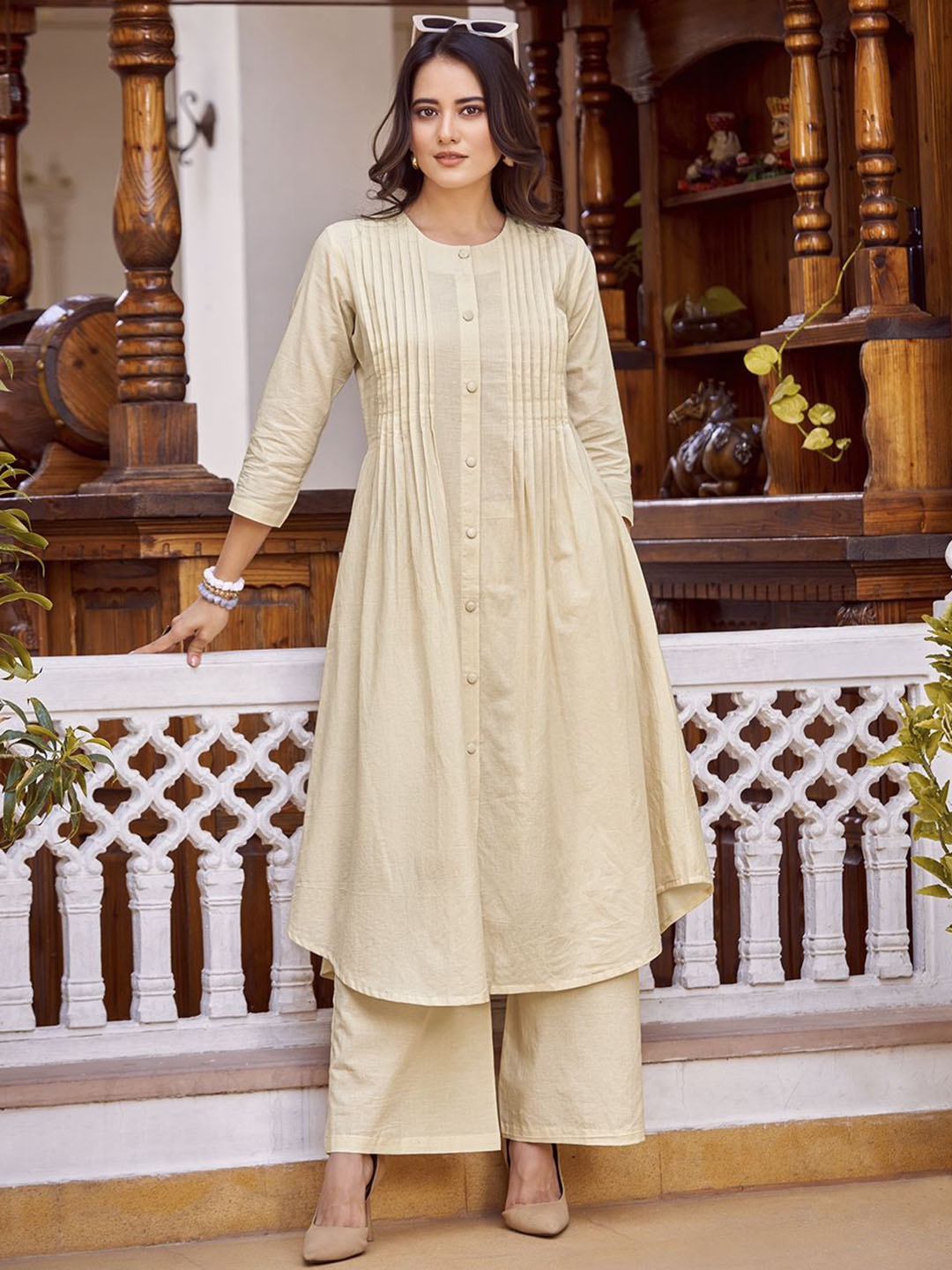 

KALINI Pure Cotton Pleated A-Line Pleated Kurta with Palazzos, Cream