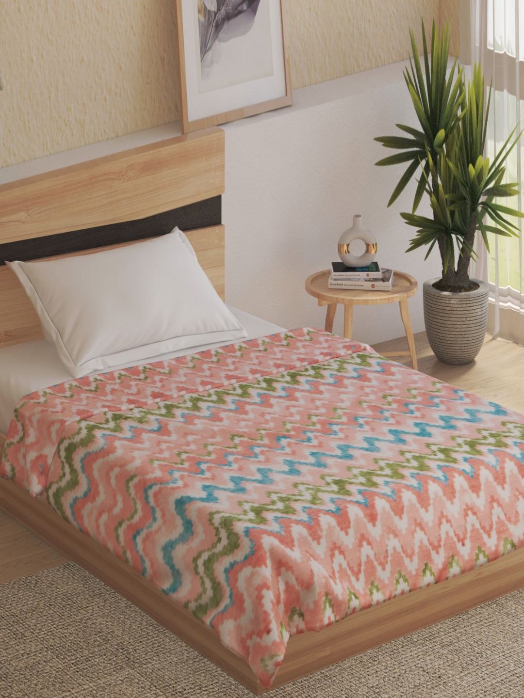 

Home Centre Coral & White Geometric 120 GSM Single Bed Blanket