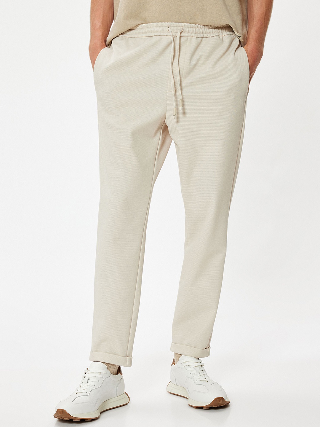 

Koton Men Regular Fit Mid Rise Trousers, Cream