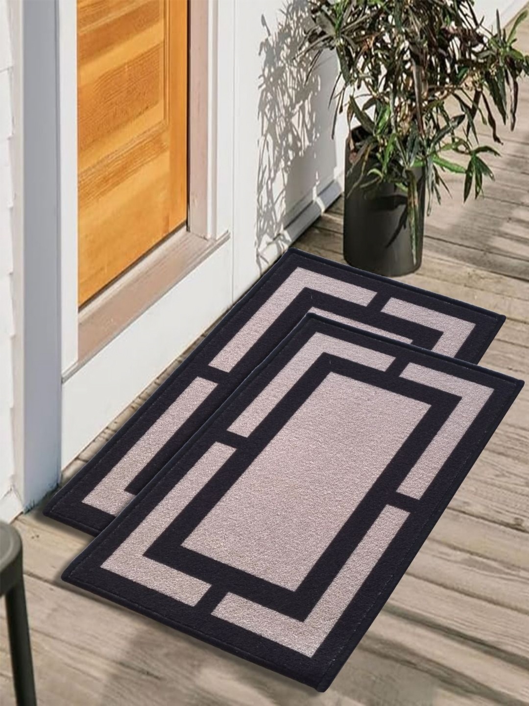 

Matz and More 2 Pieces Beige & Black Geometric Printed Anti Skid Doormats