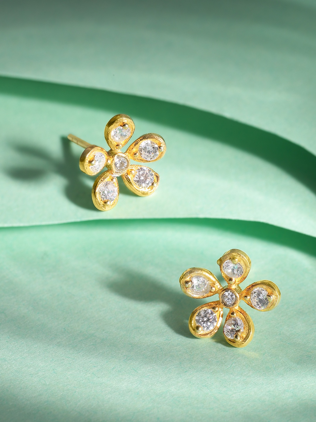 

Unniyarcha Gold-Plated Floral Stones-Studded Studs