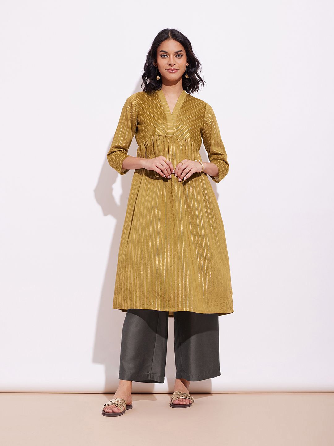 

Pink Fort Striped Zari V-Neck Pleated Kurta with Trouser, Mustard