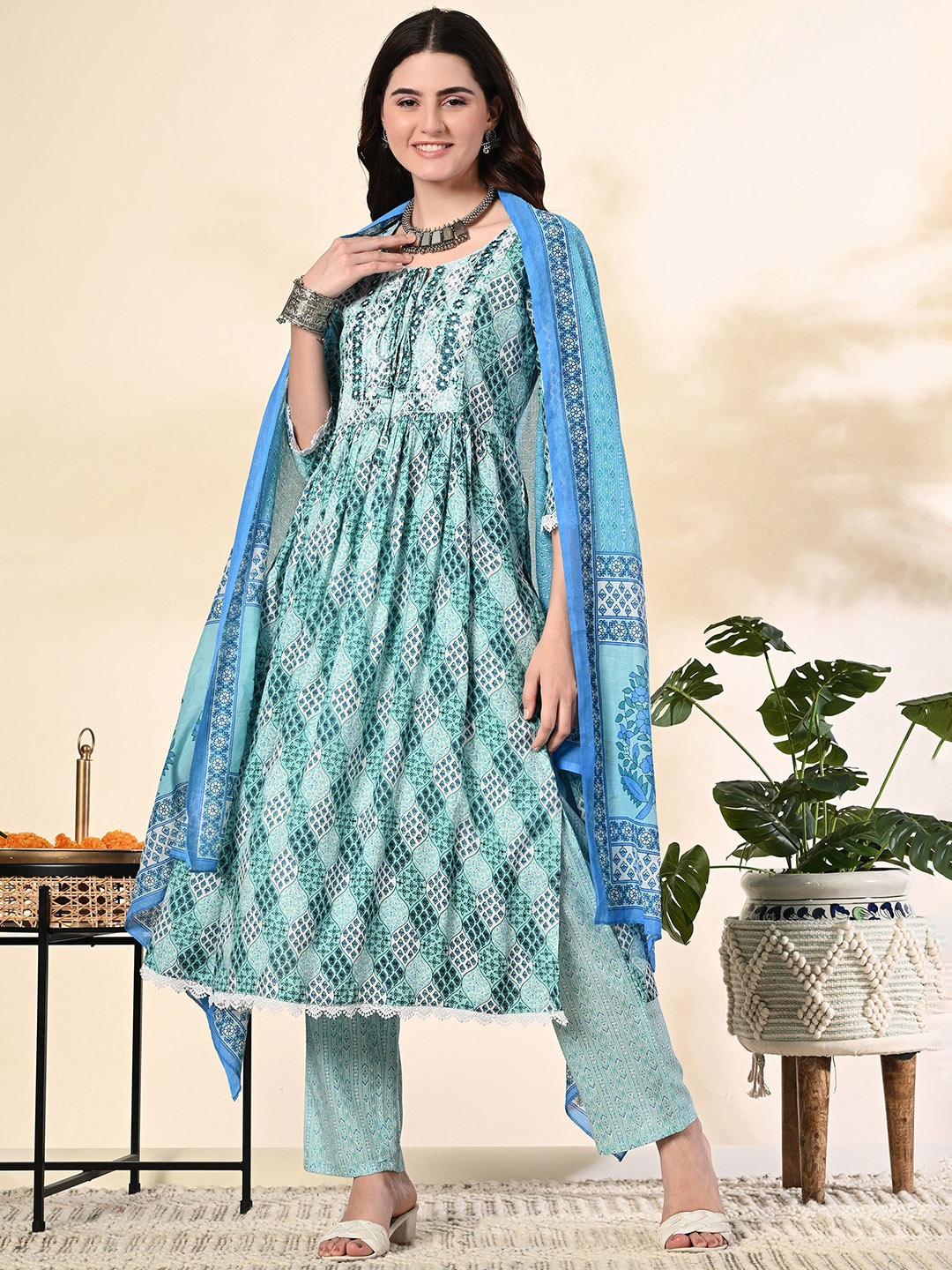 

KALINI Floral Printed Tie-Up Neck Thread Work Anarkali Kurta With Trousers & Dupatta, Sea green