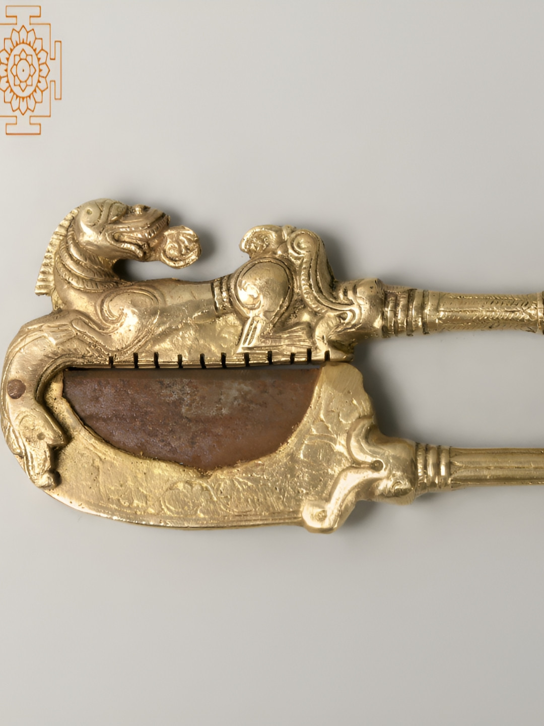 

Exotic India Gold Toned Brass and Iron Animals Figurine Nut Cracker