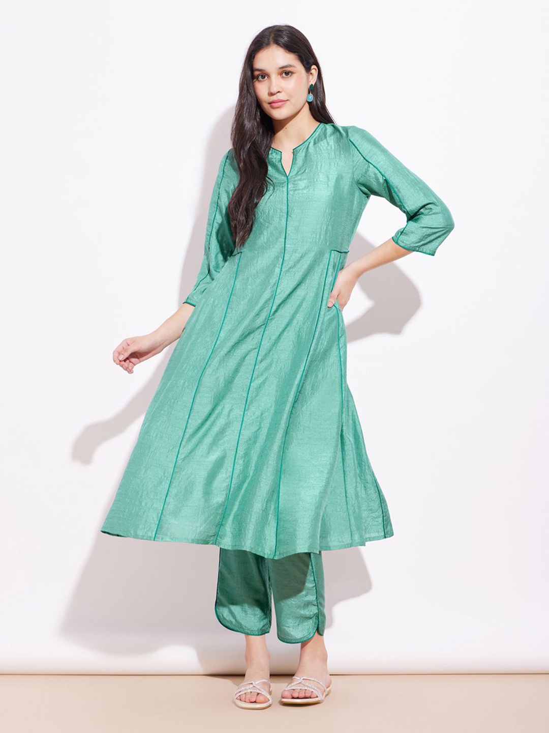 

Pink Fort Notch Neck A-Line Kurta With Trousers, Teal