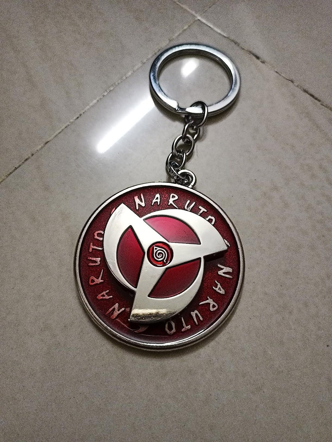 

AkashKrishna Revolving Naruto Spinner Keychain, Red