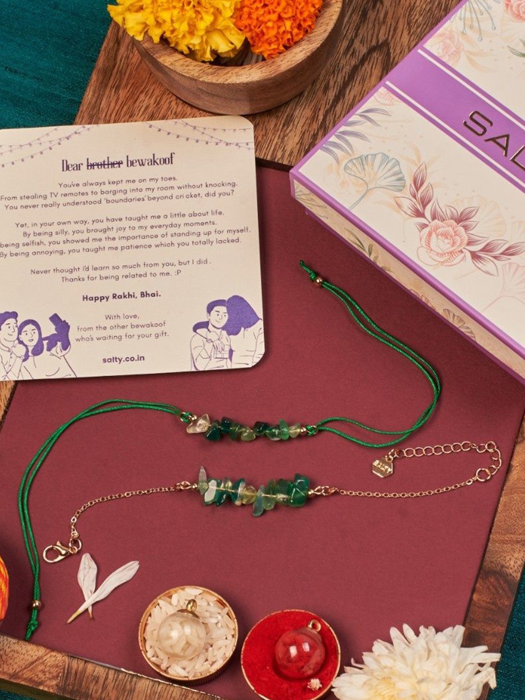 

SALTY Emerald Bhaiya and Bhabhi Rakhi Roli-Chawal & Card, Gold