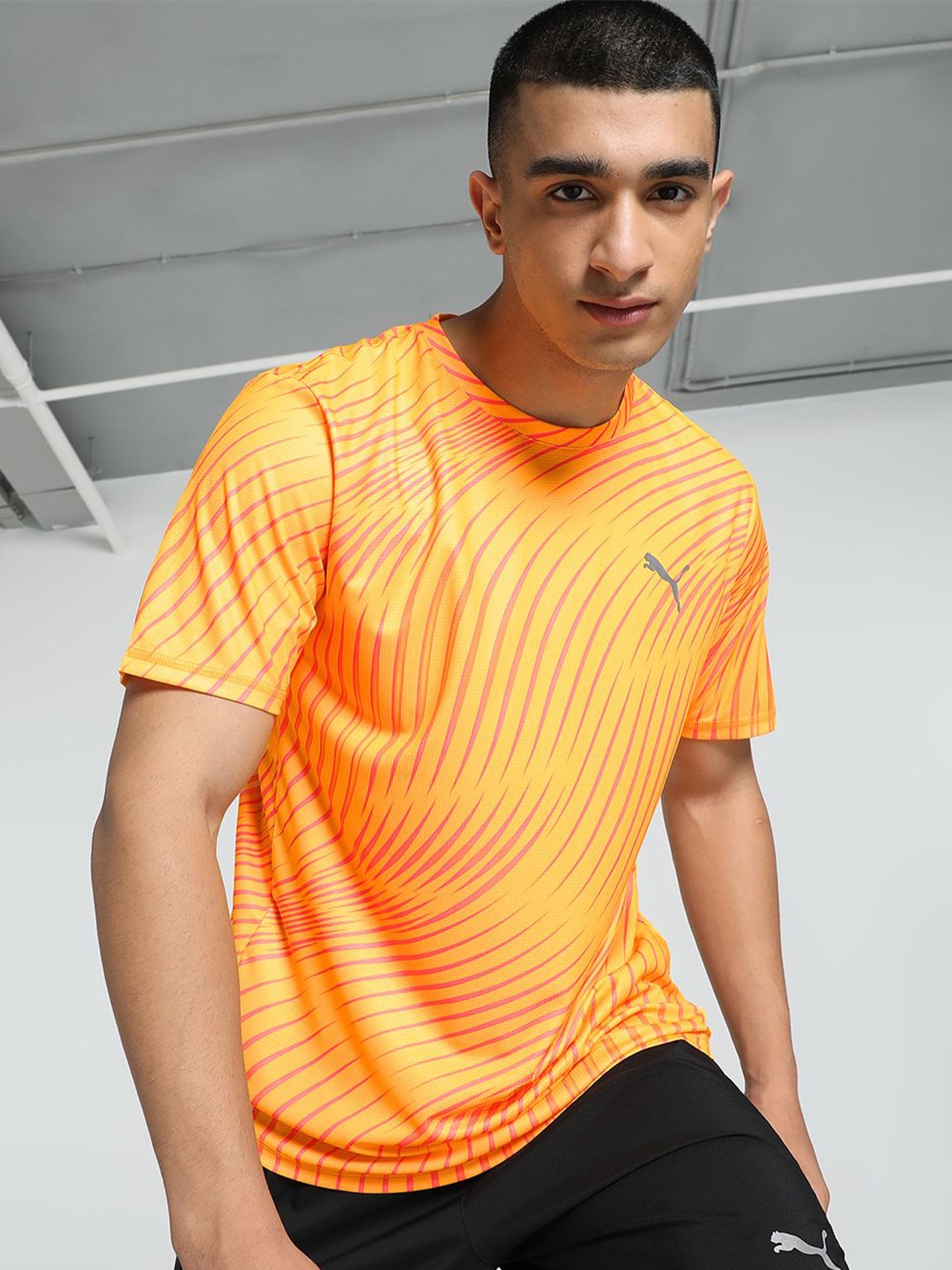 

Puma Run Favorite Aop Ss Printed Running Tee, Orange