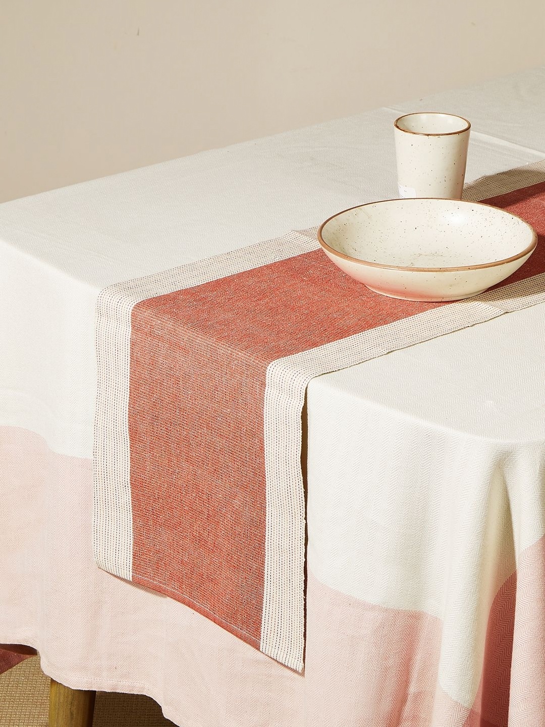 

Fabindia Nadji Orange Colored & Beige Colored Cotton Table Runners