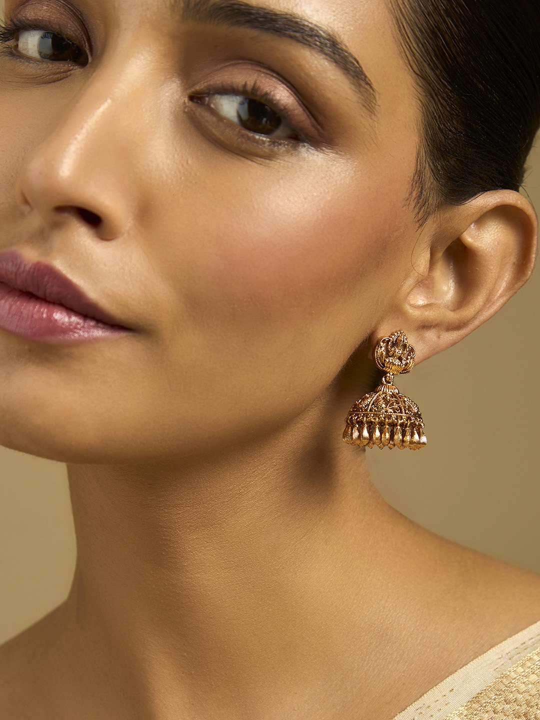 

Kushal's Fashion Jewellery Gold-Plated Dome Shaped Antique Jhumkas